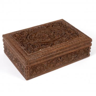 An Indian carved sandalwood/cedar