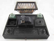 An Indian ebony desk inkstand