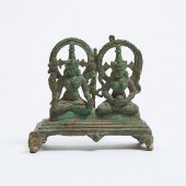 An Indian Gilt Bronze Group of