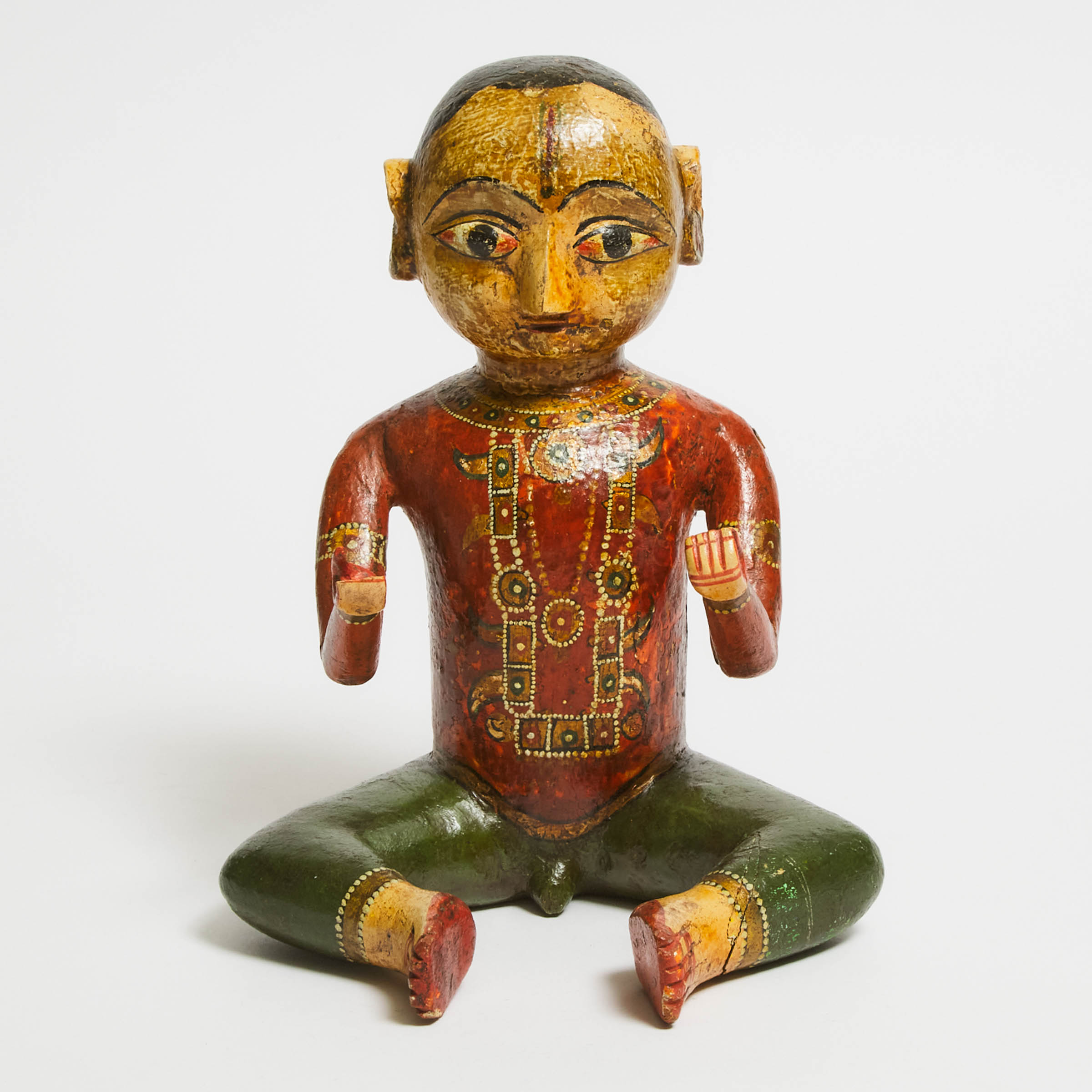 An Indian Polychrome Wood Figure of