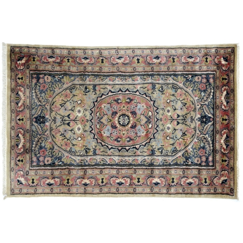 An Indian rug, with silk