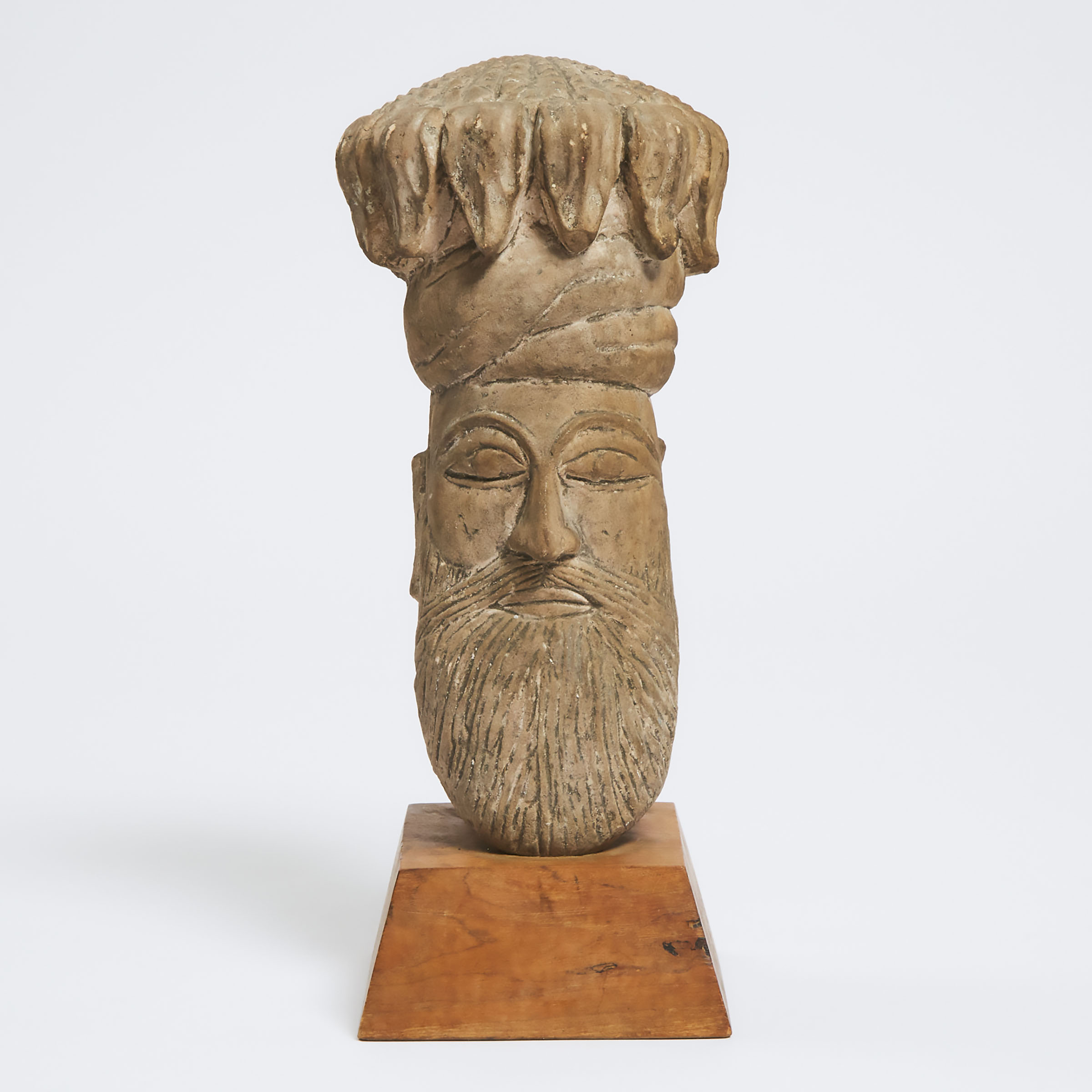 An Indian Stone Head of a King with