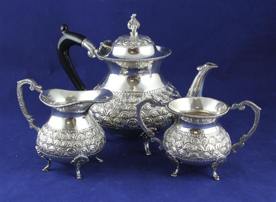 An Indian white metal three piece