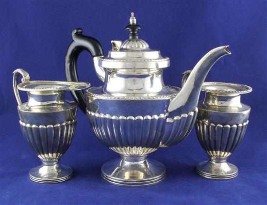 An Indian white metal three piece