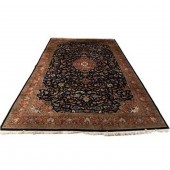 AN INDO KASHAN CARPET, 11'10"