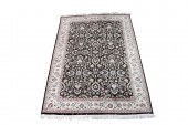 AN INDO KASHAN CARPET An Indo