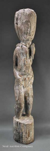 An Indonesian Baktak Carved Wo