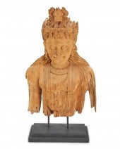 AN INDONESIAN CARVED WOOD DEIT