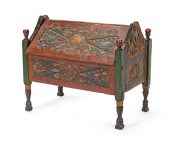 AN INDONESIAN CARVED WOOD SLAN