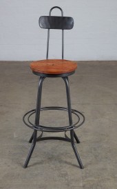 AN INDUSTRIAL IRON AND OAK DRA