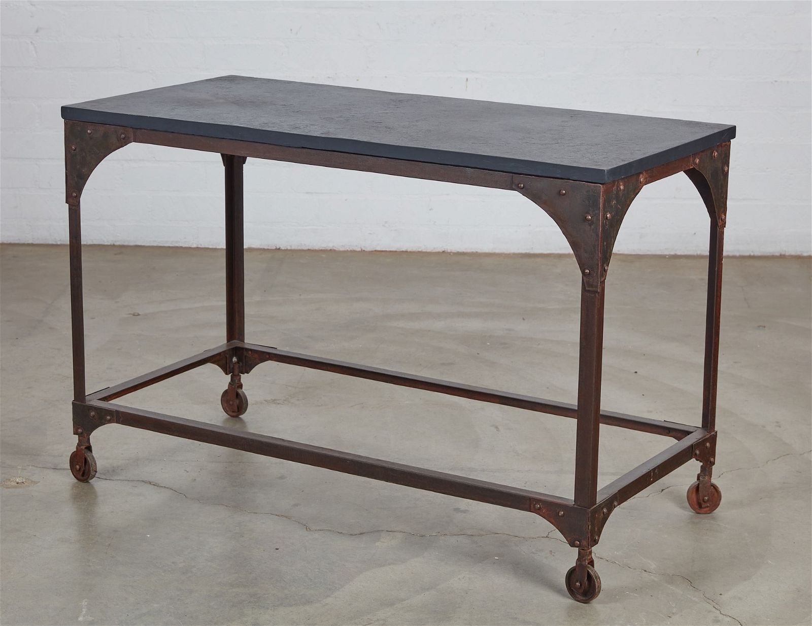 AN INDUSTRIAL METAL AND BLACK SLATE