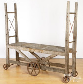 AN INDUSTRIAL WHEELED CART<br>