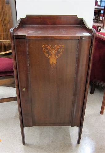 AN INLAID MAHOGANY MUSIC CABINET