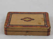 An inlaid wooden trinket box