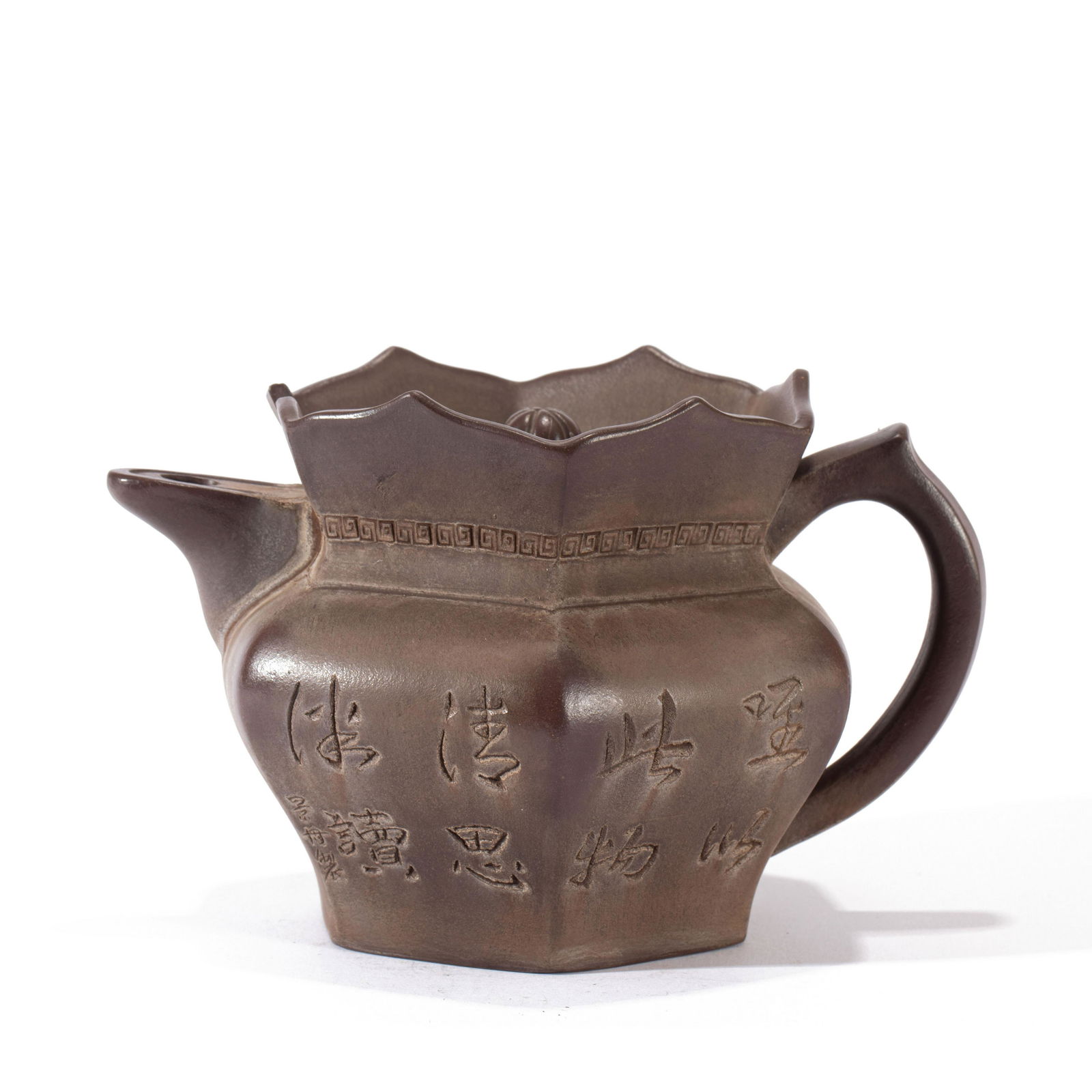 AN INSCRIBED YIXING ZISHA HEXAGONAL