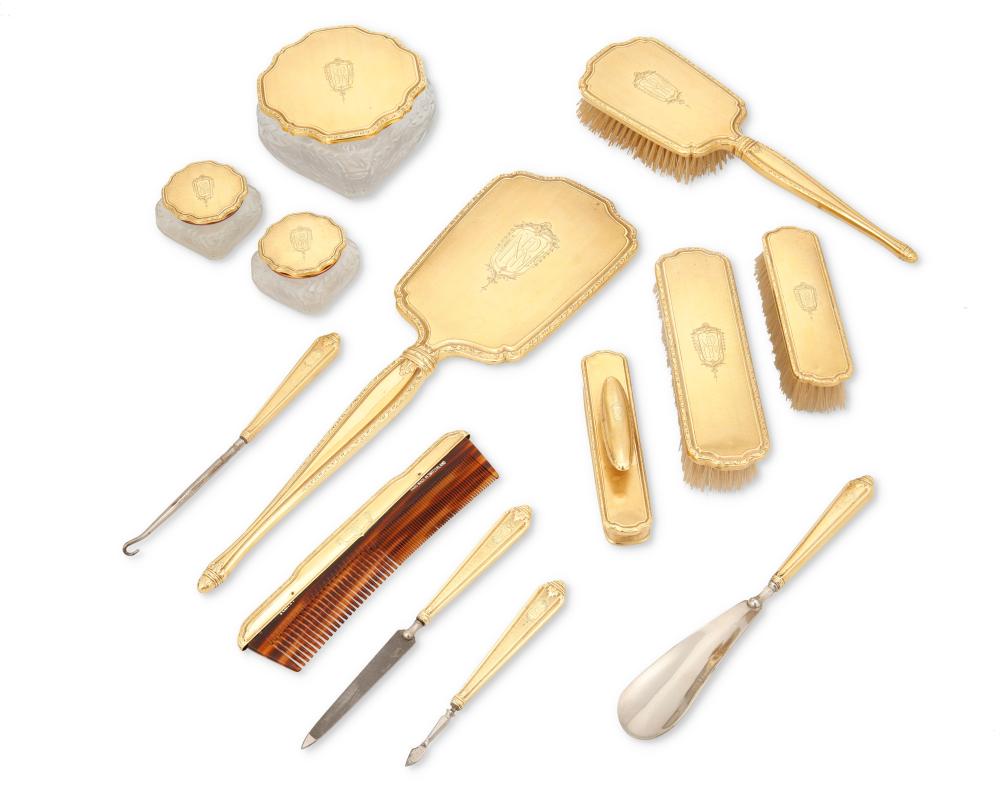 AN INTERNATIONAL 14K GOLD VANITY