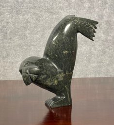 An Inuit black soapstone