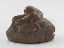 An Inuit brownstone carving of a