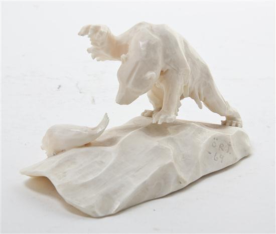 An Inuit Carved Ivory Figural Group