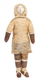 AN INUIT DOLL OUTFITTED IN VEL