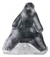AN INUIT FIGURAL SCULPTURE ATT