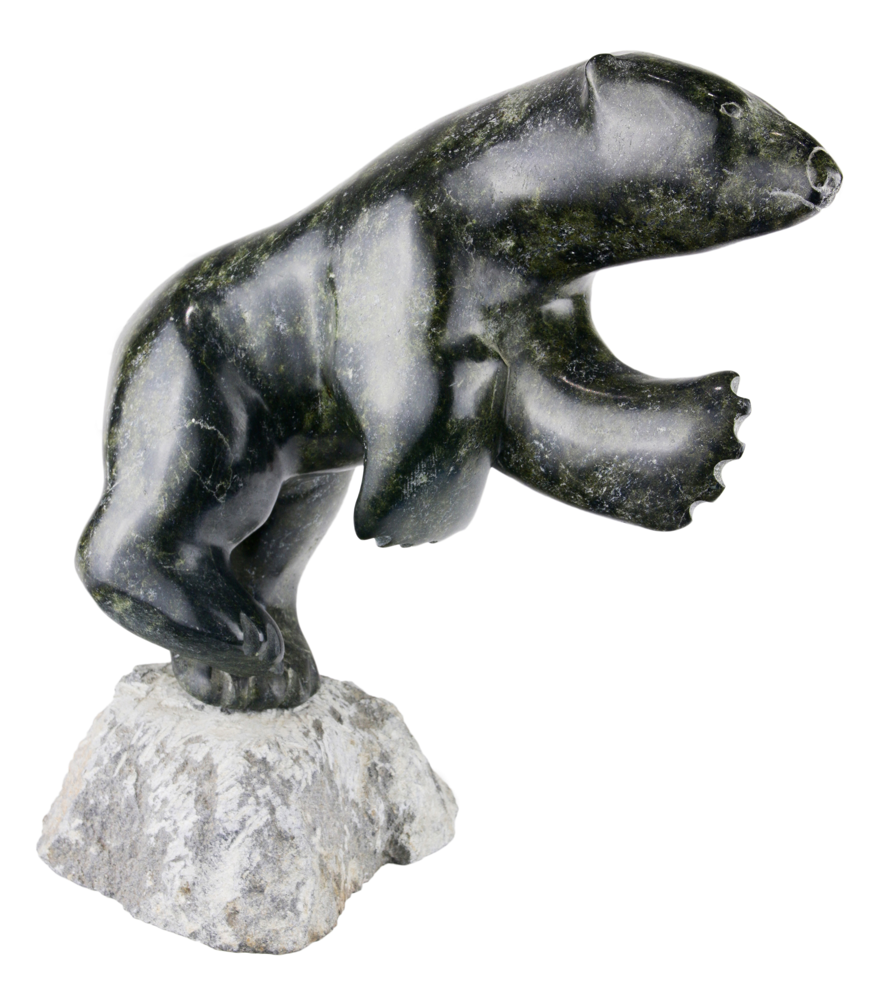 AN INUIT FIGURAL SCULPTURE OF A