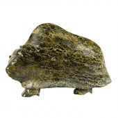 AN INUIT GREEN SERPENTINE SCUL