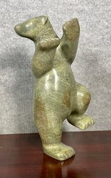 An Inuit green soapstone sculpture,