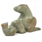 AN INUIT SCULPTURE BY KOMWARTO