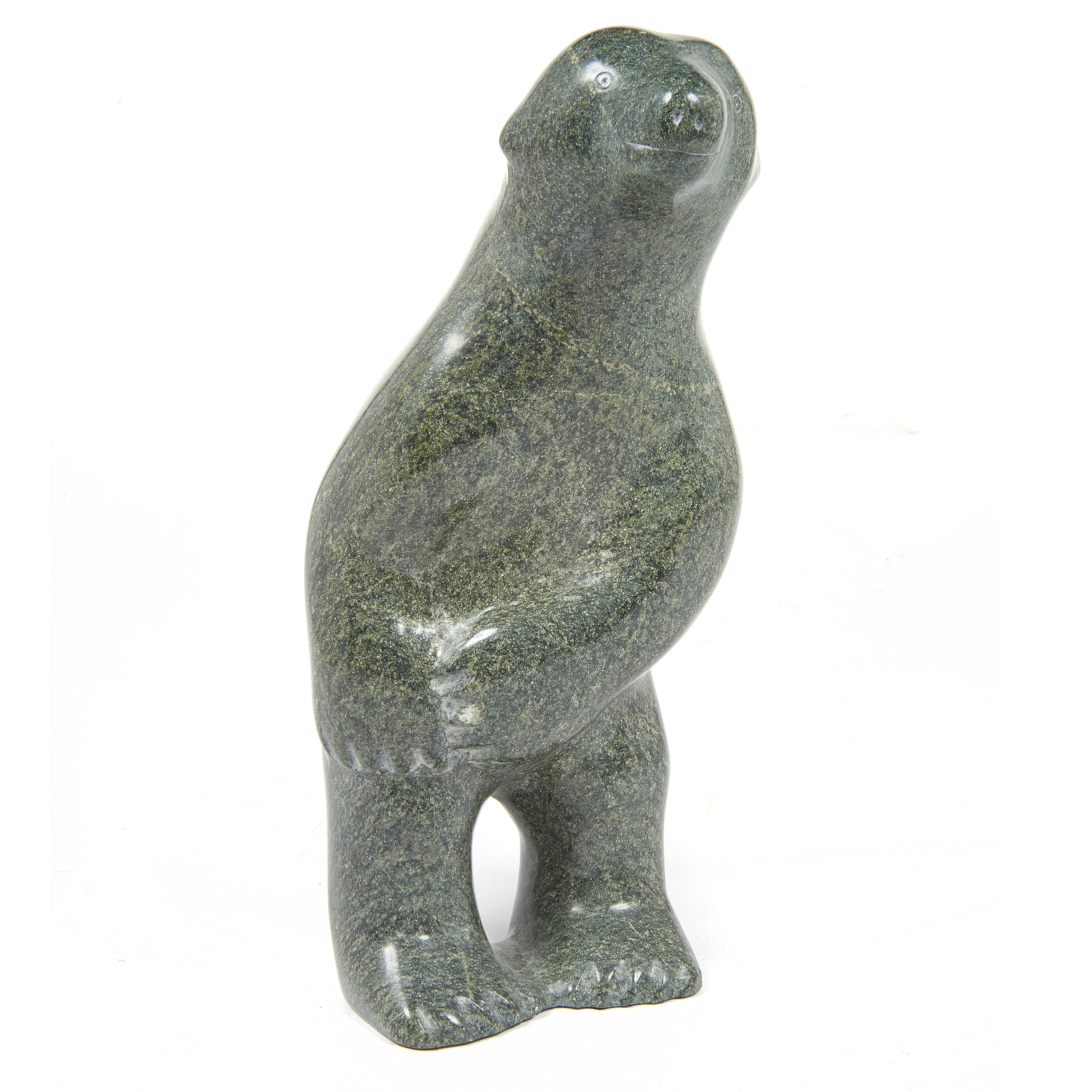 AN INUIT SCULPTURE OF A STANDING