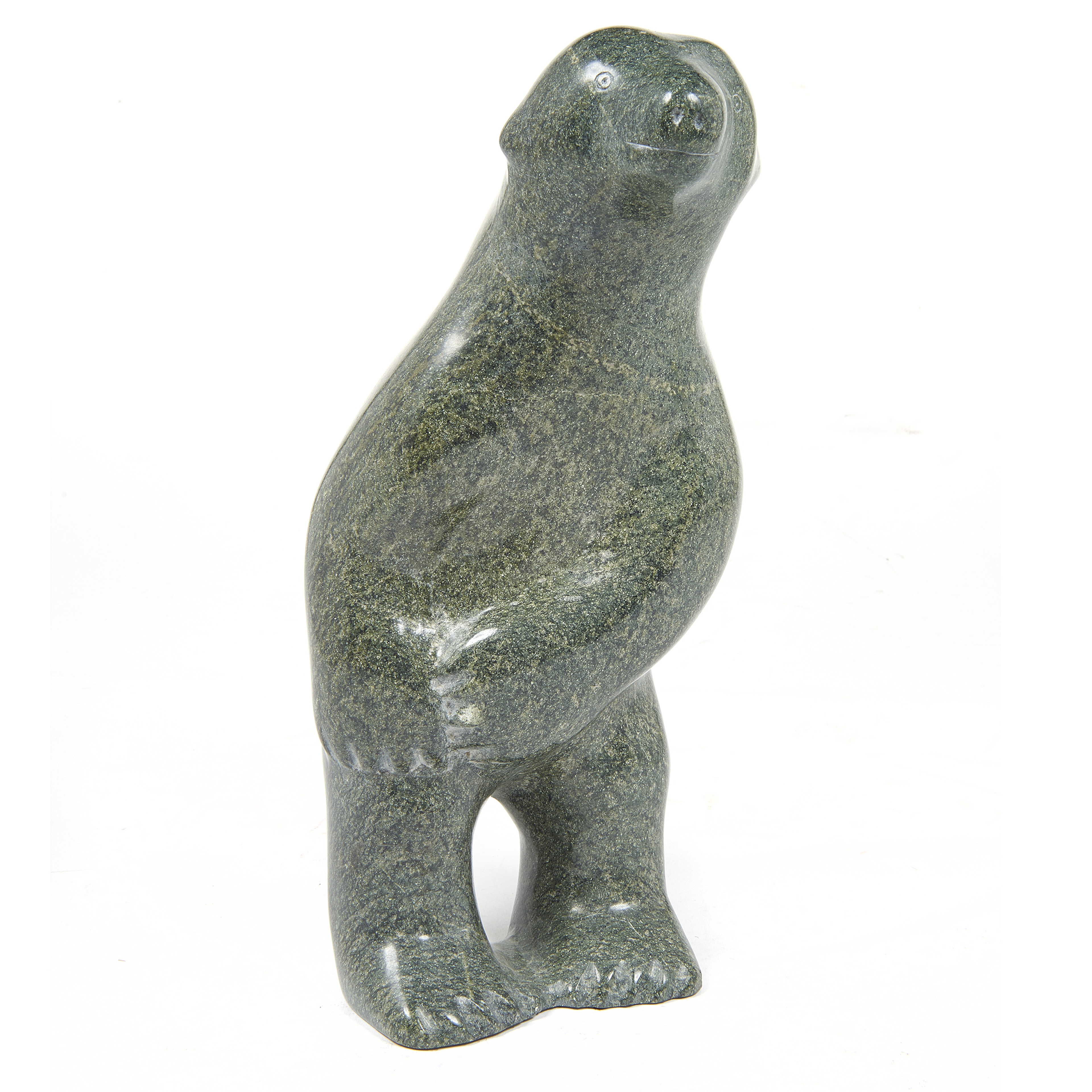 AN INUIT SCULPTURE OF A STANDING