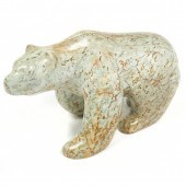 AN INUIT SCULPTURE OF A RUNNIN