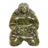 AN INUIT SERPENTINE FIGURE OF