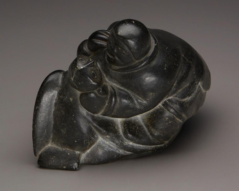 AN INUIT STEATITE SCULPTURE, BY