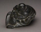 AN INUIT STEATITE SCULPTURE, B