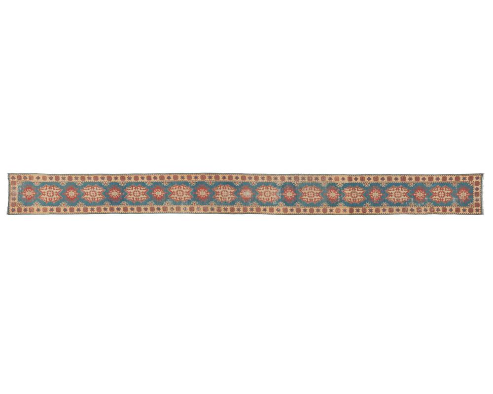 AN IRANIAN FLATWEAVE RUNNERAn