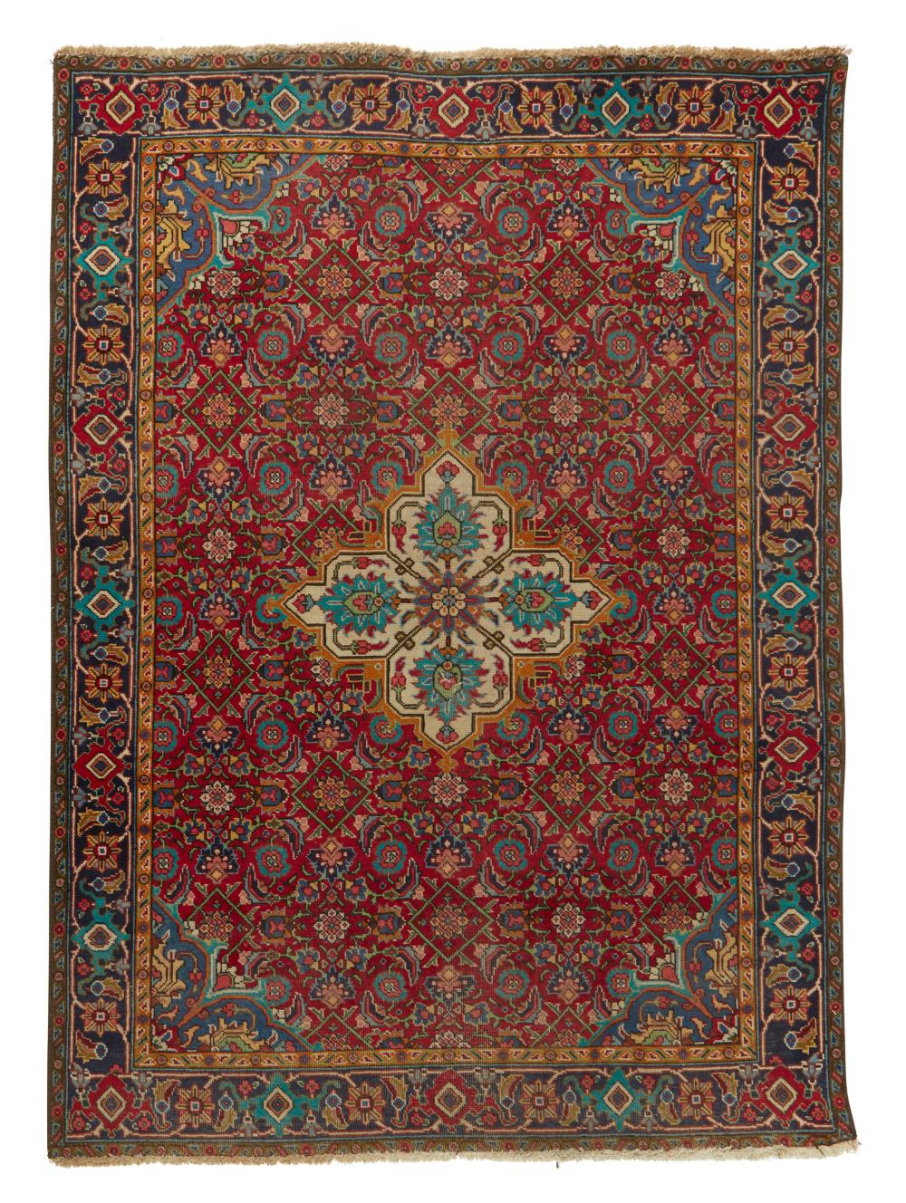 AN IRANIAN RUGAn Iranian rug,  20th
