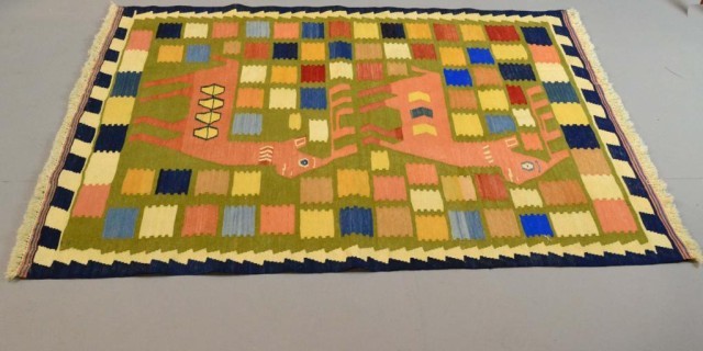 AN IRANIAN WOVEN TEXTILEDepicting