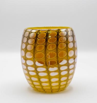 An iridescent glass vase of