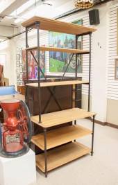 AN IRON ETAGERE WITH OAK SHELV