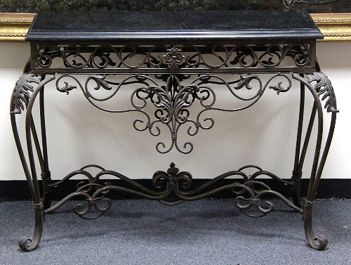 An iron pier table with black