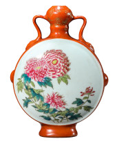 AN IRON-RED MEDALLION 'FLORAL'