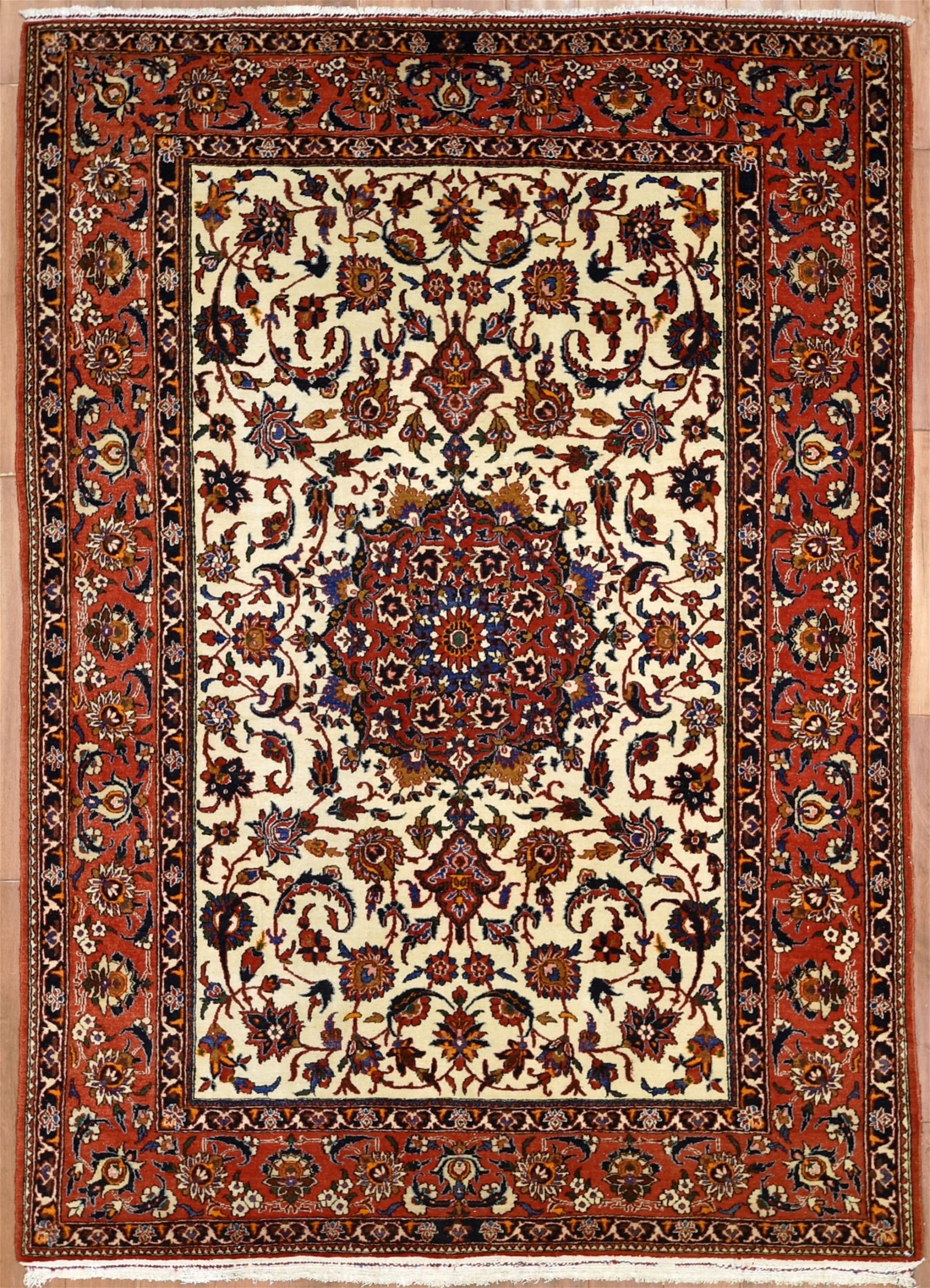 AN ISFAHAN RUG, CENTRAL PERSIAAn