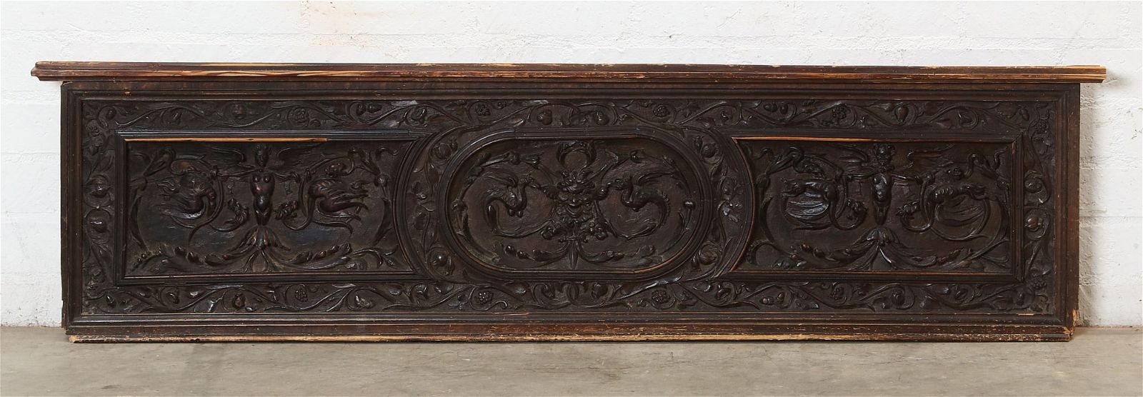 AN ITALIAN BAROQUE STAINED WALNUT