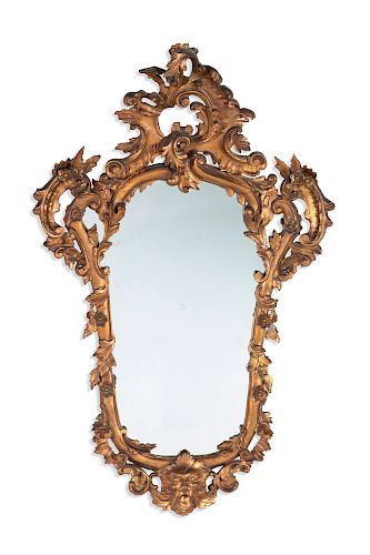 AN ITALIAN BAROQUE STYLE CARVED