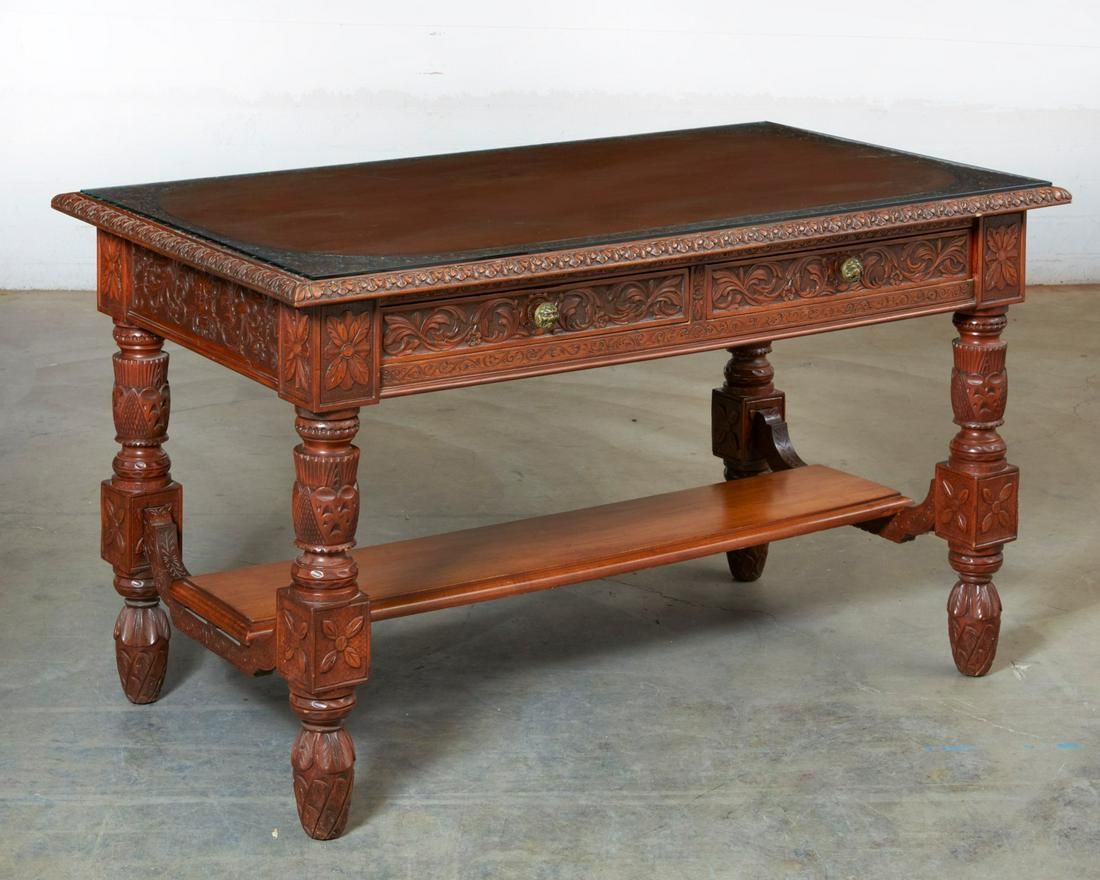 AN ITALIAN BAROQUE STYLE WALNUT