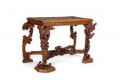 AN ITALIAN BAROQUE STYLE WALNU