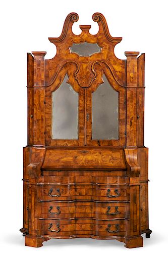 AN ITALIAN BAROQUE STYLE WALNUT