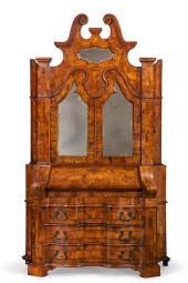 AN ITALIAN BAROQUE STYLE WALNU