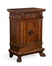 AN ITALIAN BAROQUE STYLE WALNU